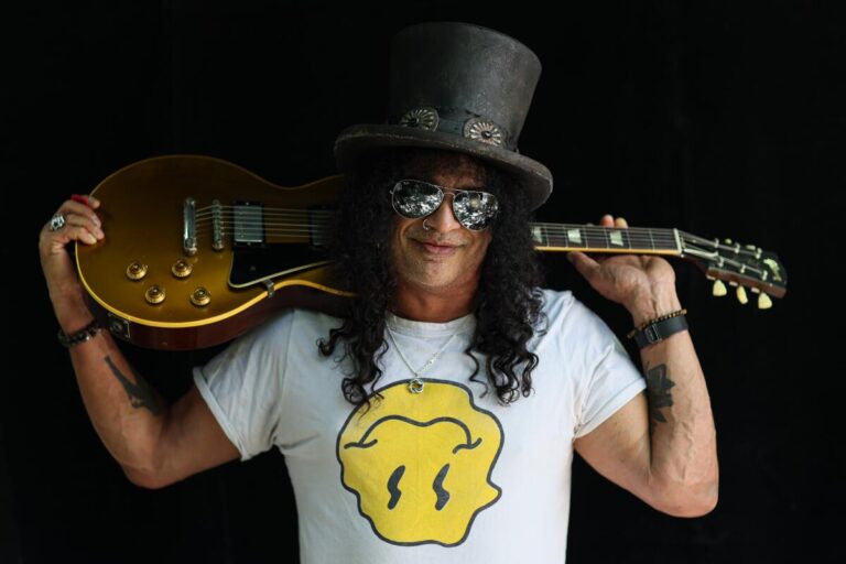 This image is about Slash wearing his Top Hat